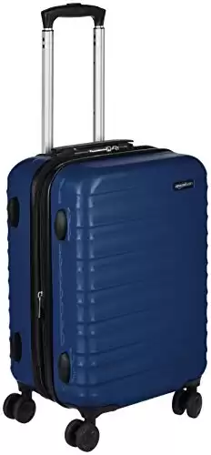 Amazon Basics Expandable Hardside Carry-On Luggage, Suitcase with Wheels, 21-inch Spinner with Four Spinner Wheels and Scratch-Resistant Surface, Navy Blue